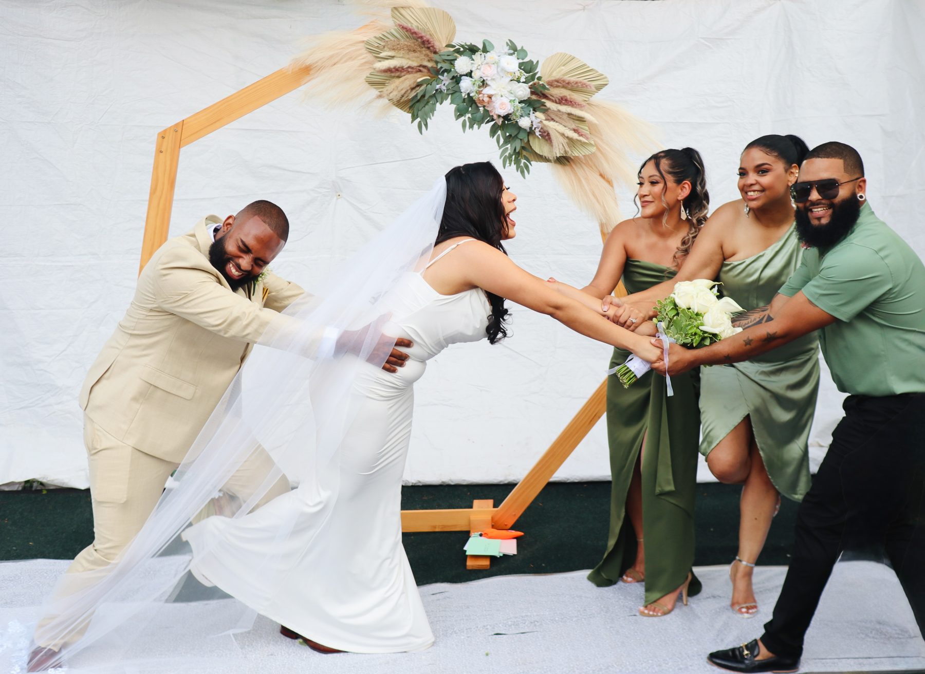 Playful wedding party moment
