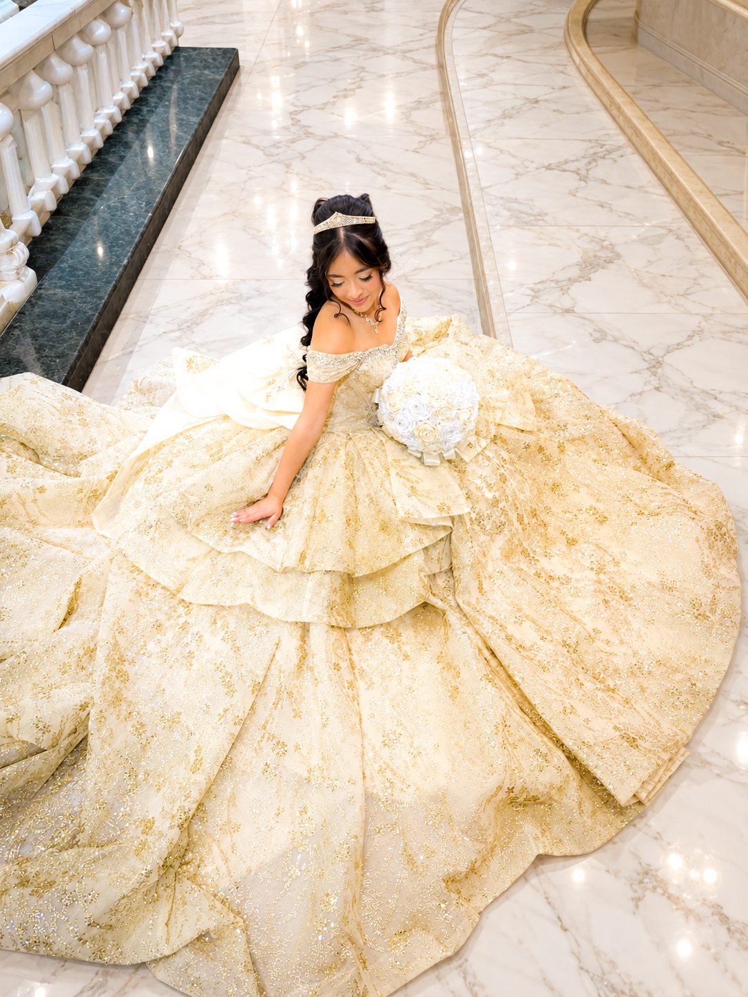 Quinceañera gown on a marble staircase