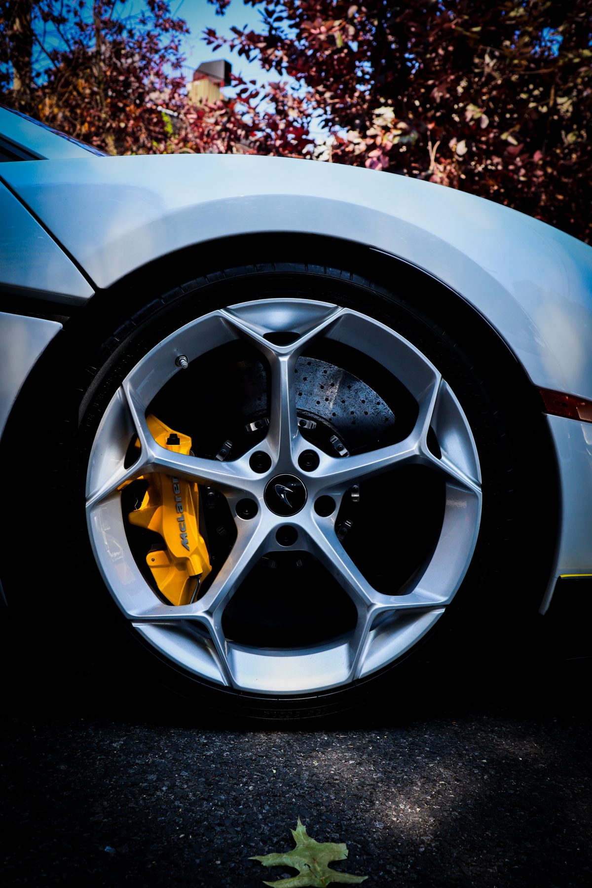 Detail of a silver sports car wheel