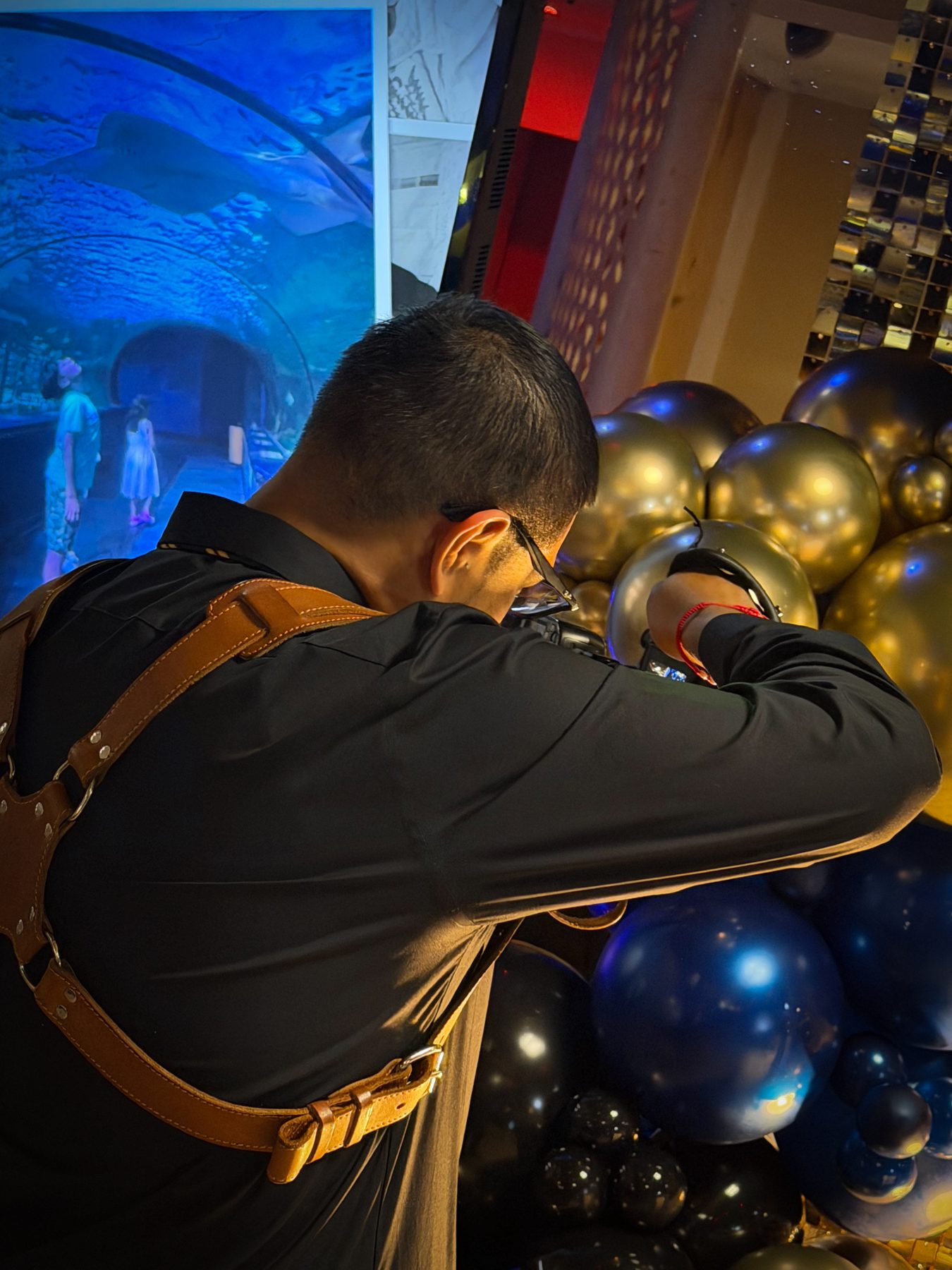 Maicol photographing an event