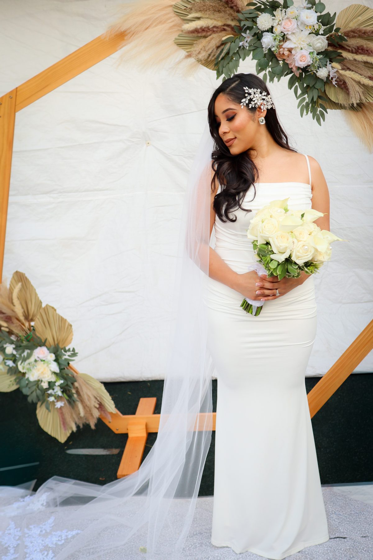 Bride holding a white bouquet